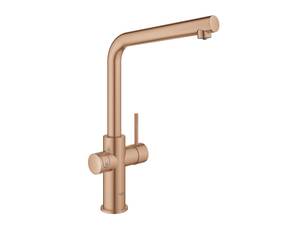 Die Armatur Grohe «Blue» für gefiltertes sprudelndes oder stilles kühles Wasser begeistert in verschiedenen Farben, wie beispielsweise «warm sunset».Grohe.