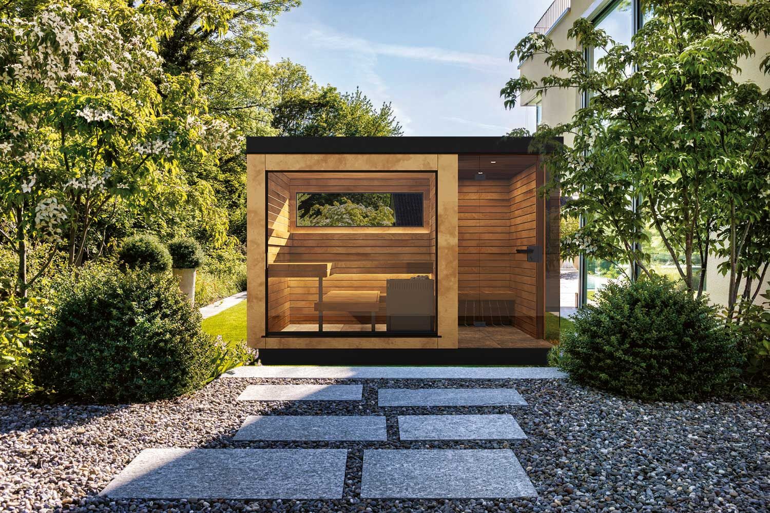 Die Outdoor-Sauna «Nido Ottone» fügt sich mit ihrem schlichten Design, grossflächigen Glasfronten und edlem Holz perfekt in die Umgebung ein. Sie kann mit einem Vorraum mit Garderobe oder Dusche erweitert werden. Küng Wellness AG, kueng.swiss